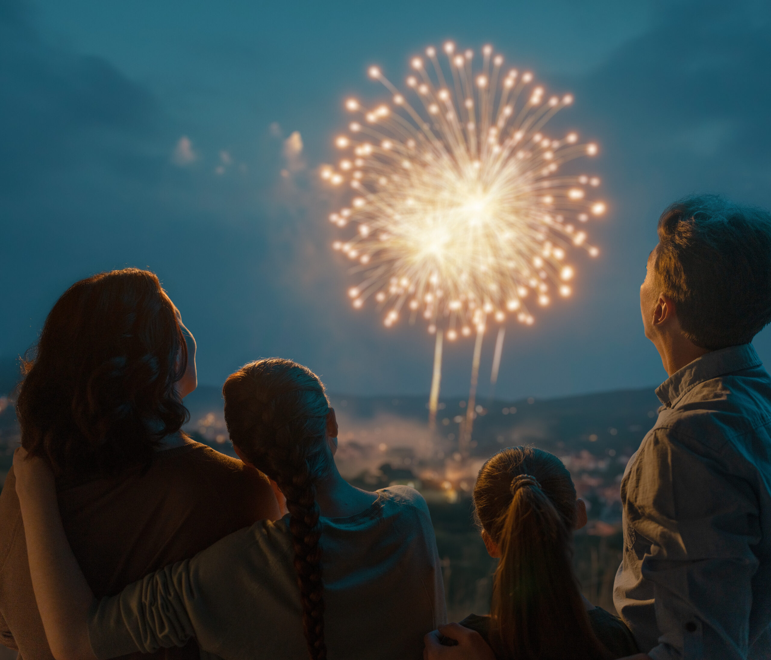 Happy loving family watching fireworks.